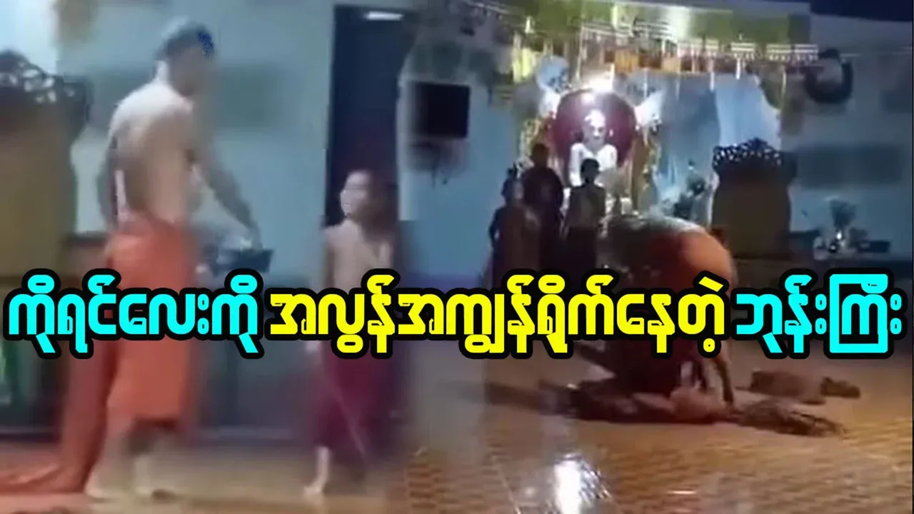 The monk is disciplining the young monk is talking too much