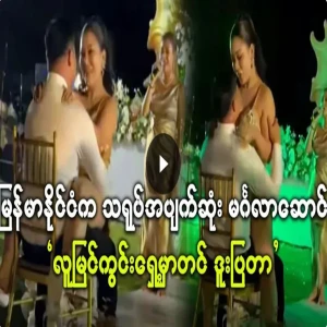 Two happy couples dancing at a wedding reception