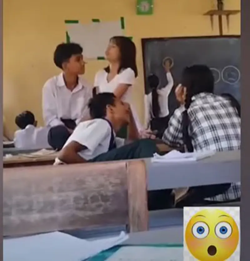 The white and green young men studying literature in the room